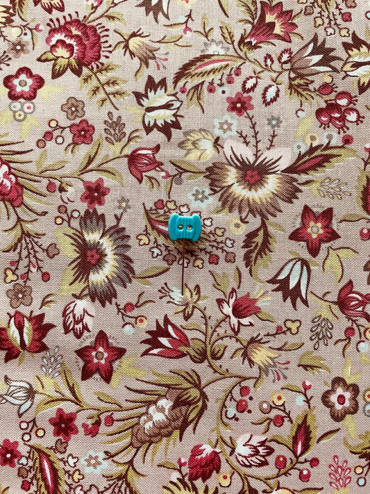 Tela estampada de flores de fondo beige